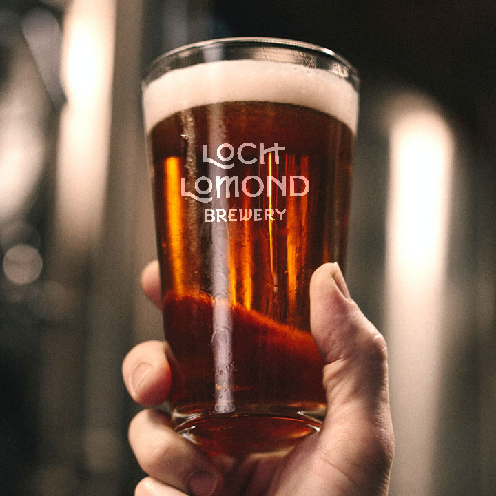 A realistic retouched image, adding the Loch Lomond Brewery logo onto a pint glass.