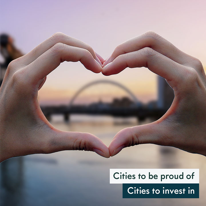 A retouched image of the Glasgow skyline with hands making a heart-shape superimposed on top. It looks realistic, as if it was a photo. Text says: Cities to be proud of, cities to invest in.
